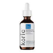 Koric face and neck oil bottle with dropper on a white background