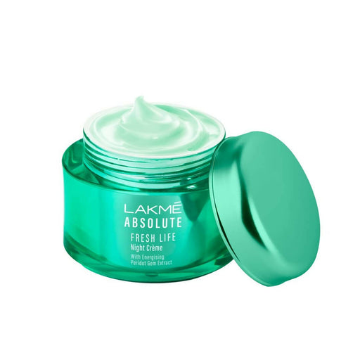 Green jar of Lakme Absolute Fresh Life Night Creme on a white background