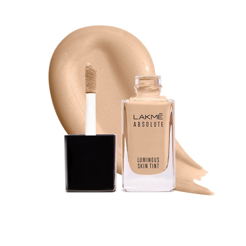 Lakme Absolute Luminous Skin Tint with applicator on a white background