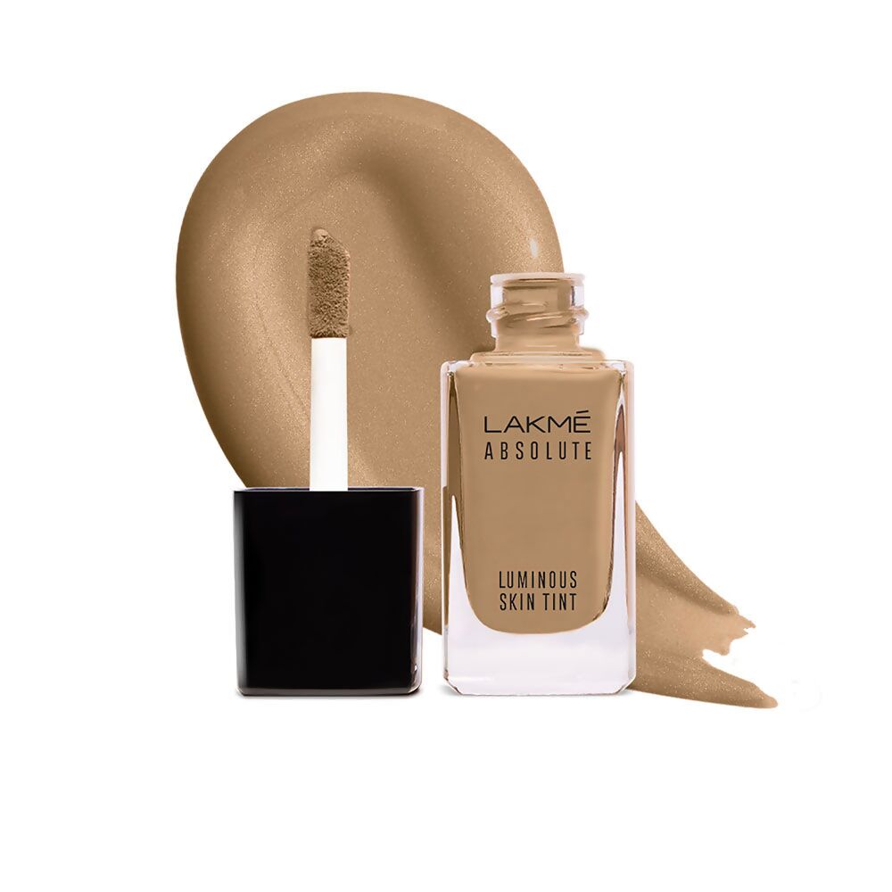 Lakme Absolute Luminous Skin Tint with applicator on a white background