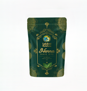 Green package of Lakshmi Krishna Henna Hair Dye on a white background
