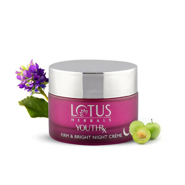 Lotus Herbals YouthRx Firm & Bright Night Crème jar with purple flower and green fruit on a white background