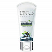 A tube of Lotus Herbals WhiteGlow Activated Charcoal Brightening Facewash with a white and blue color scheme.