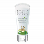 A tube of Lotus Herbals White Glow Oatmeal And Yogurt Skin Whitening Scrub with green accents on the packaging.