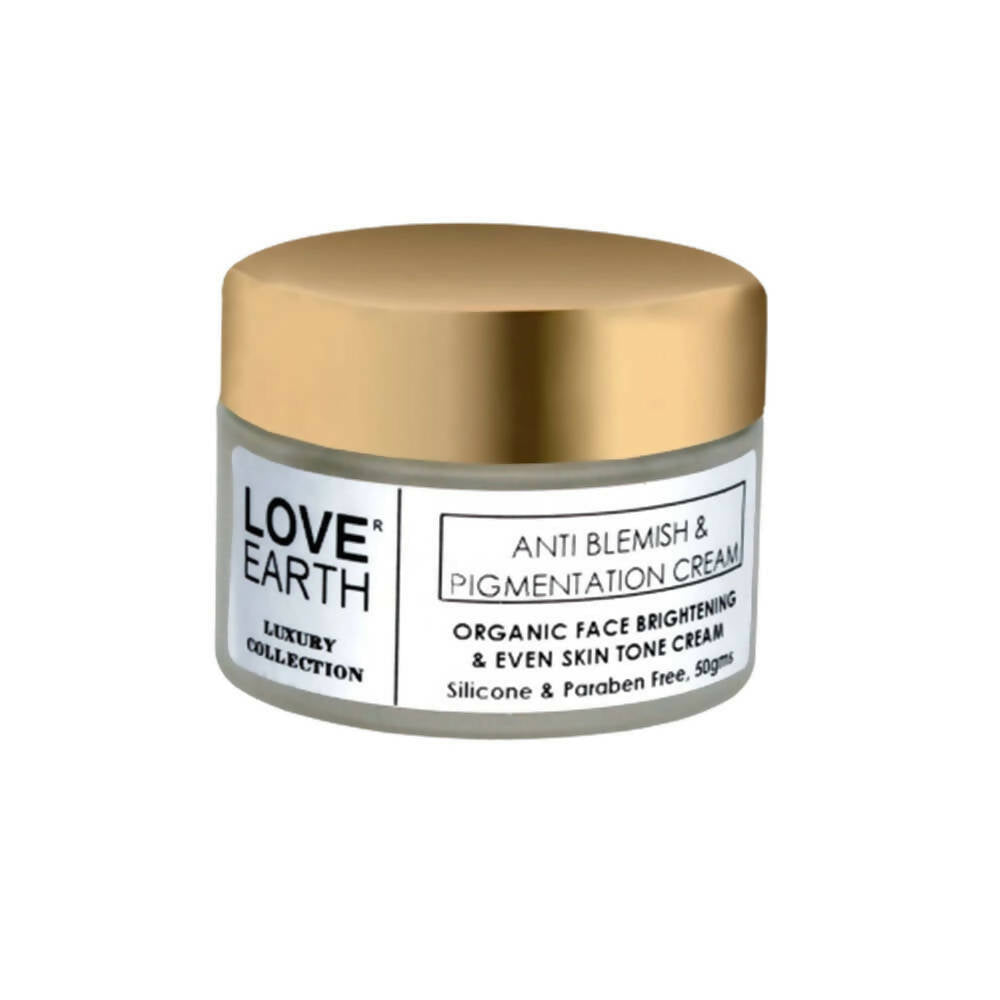 Love Earth anti blemish and pigmentation cream jar with gold lid on a white background