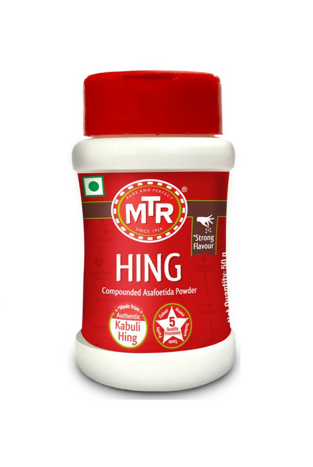 MTR Hing ( compounded asafoetida powder) container with red lid on a white background