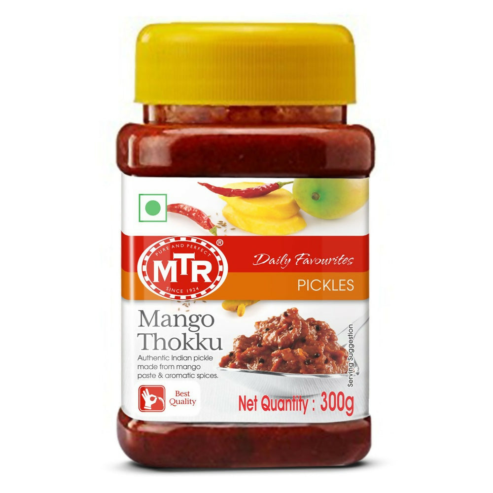 Jar of MTR Mango Thokku pickle with a yellow lid on a white background