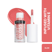 Revolution Baby Gloss lip gloss with applicator on a white background