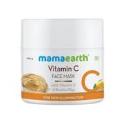 A jar of Mamaearth Vitamin C Face Mask with the label showing the product name and its use for skin illumination.