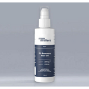Bottle of man matters 5% Rosemary Hair Oil on a gray background