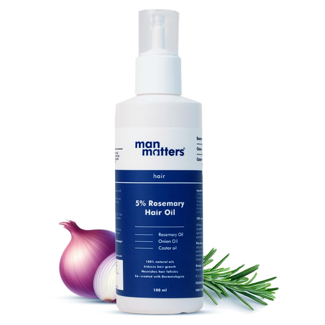 Bottle of man matters 5% Rosemary Hair Oil with a white background