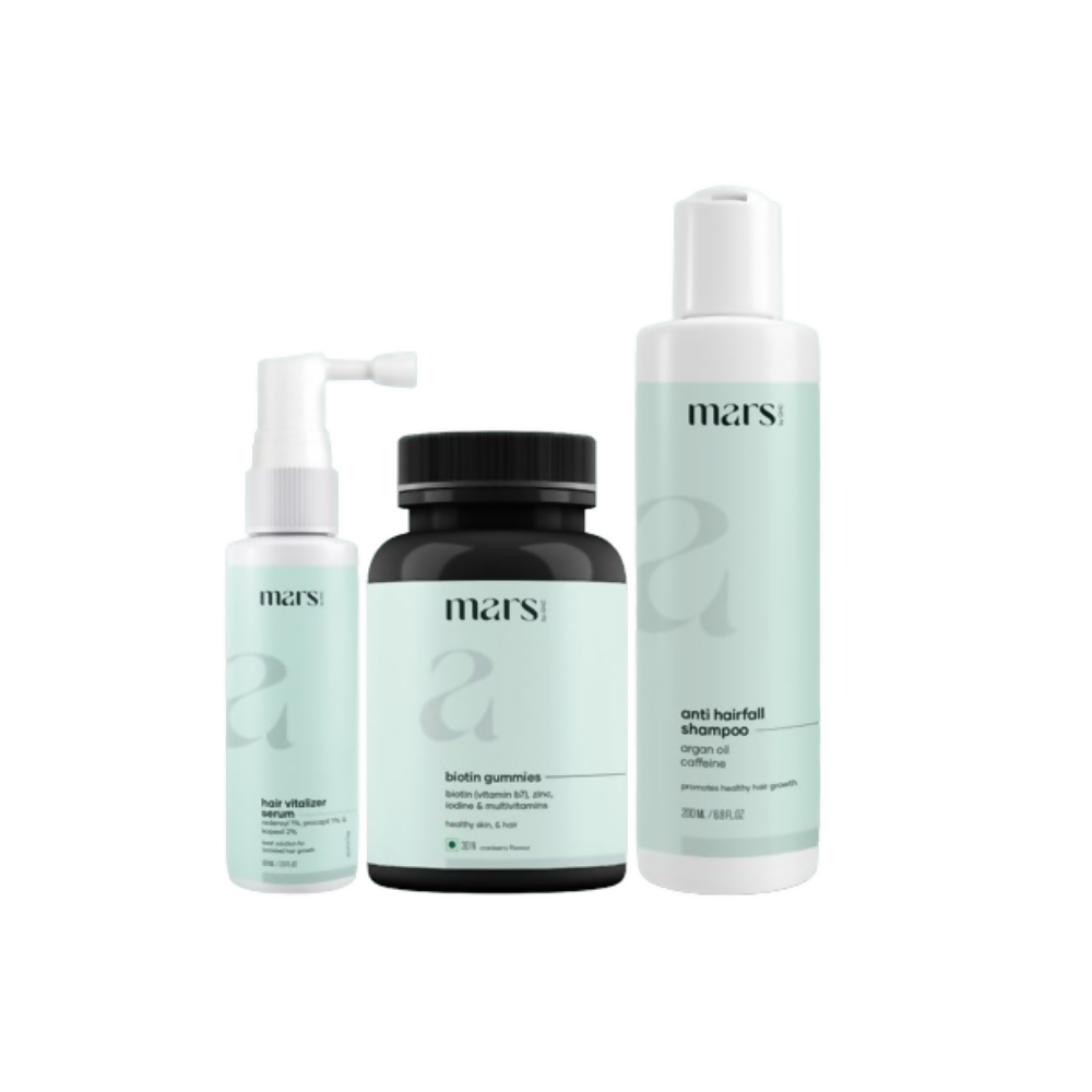 Three bottles of Mars hair care products on a white background