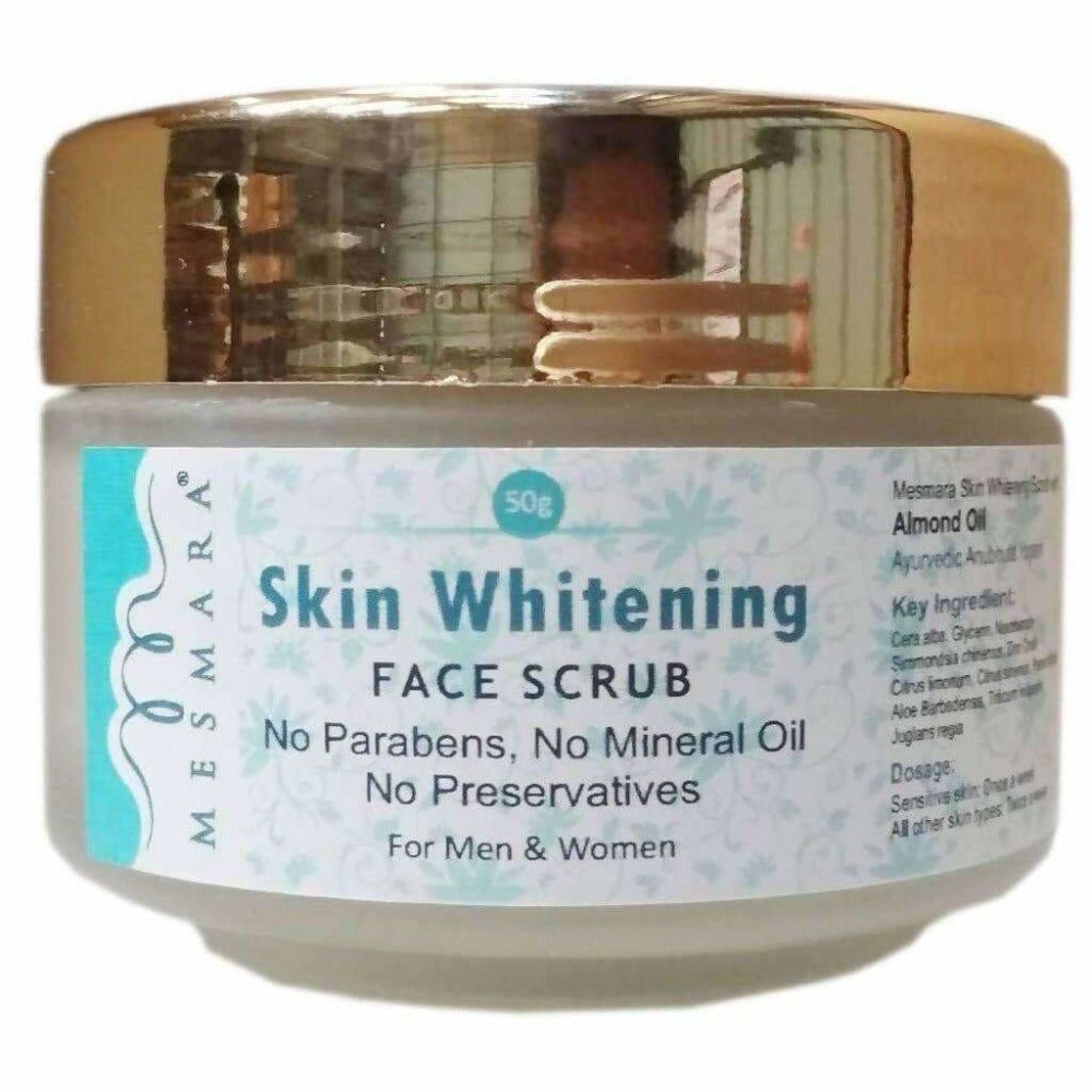 Mesmara Skin Whitening Face Scrub in a golden jar with a white label, indicating it is paraben free, no mineral oil, and no preservatives.
