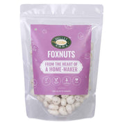 Packaged foxnuts with a purple label on a white background