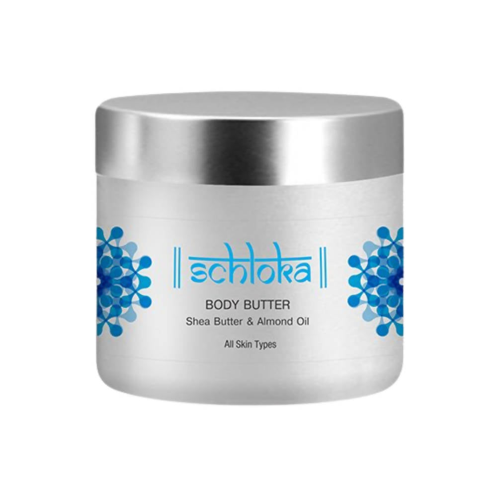Schtoka body butter jar with silver lid on a white background