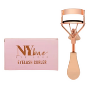 Rose gold eyelash curler with pink packaging featuring 'NYbae' branding on a white background.