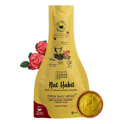 Yellow package of Nat Habit Fresh Daily Ubtan with a scoop of product and roses on a white background