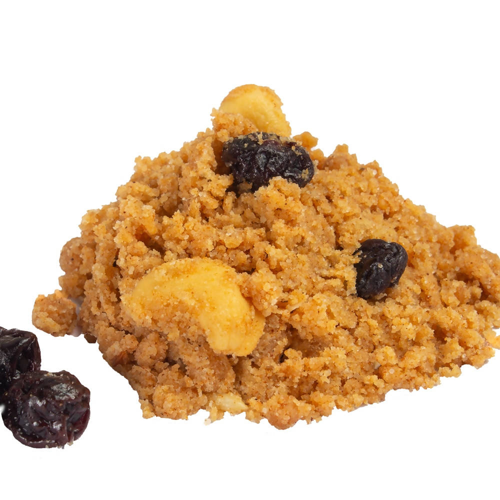 Close-up of a cookie with raisins on a white background