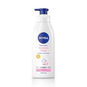 Nivea body lotion bottle with 'Natural Glow' text on a white background