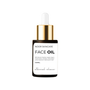 Noor Skincare face oil bottle with dropper on a white background