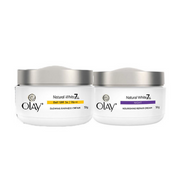 Two Olay cream jars, one for day and one for night, on a white background.
