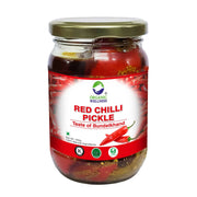 Jar of Red Chilli Pickle with Organic Wellness label on a white background