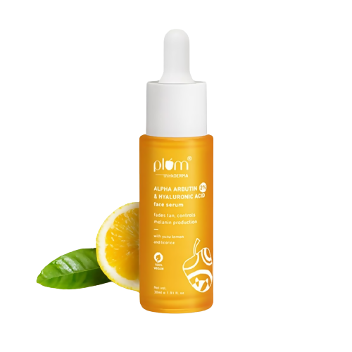 Orange skincare serum bottle with dropper on a white background