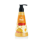 Bottle of Caramel Popcorn body wash with pump on a white background