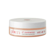 Cleansing balm jar with 'e-luminence' branding on a white background