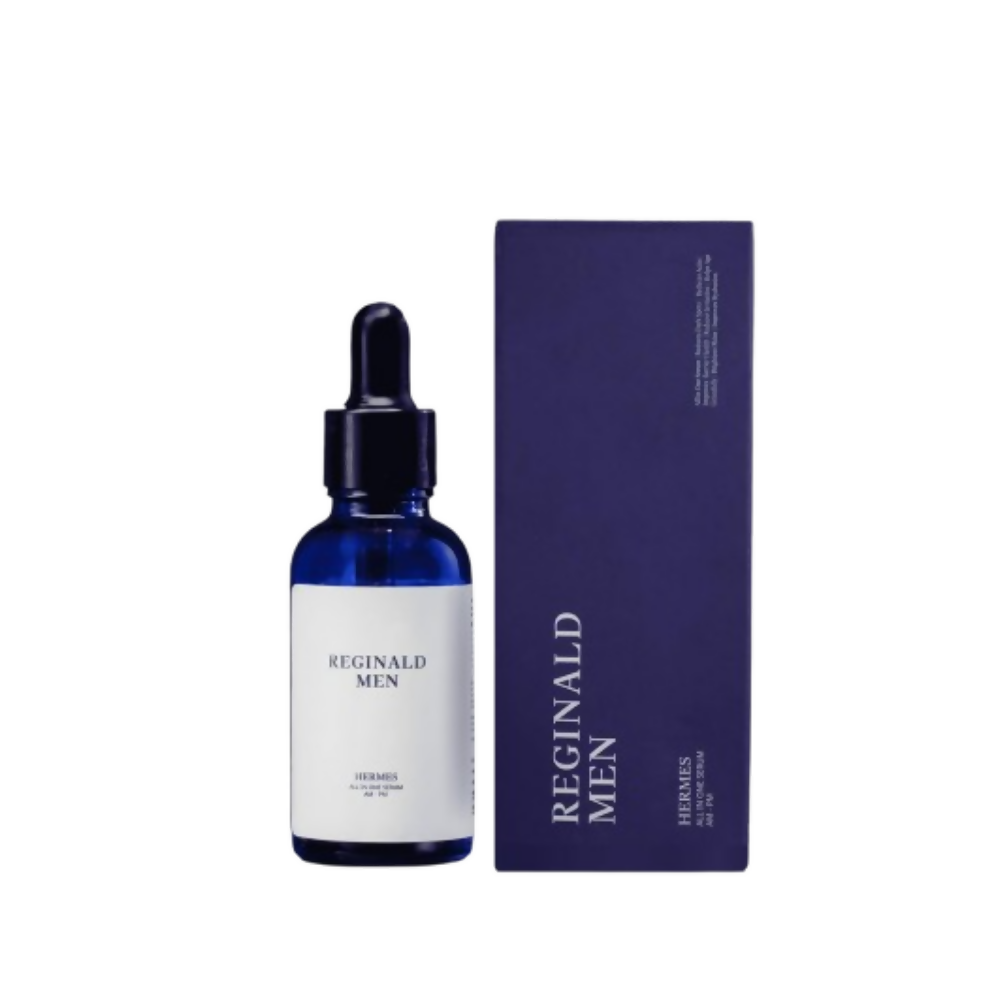 Reginald Men skincare bottle with dropper and packaging on a white background