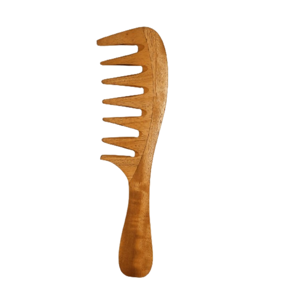Wooden comb on a white background