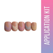 Nail art application kit with swirled nail designs on a white background