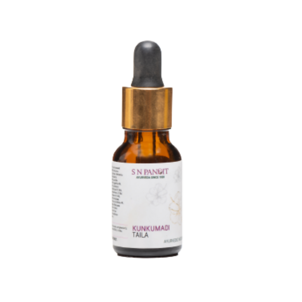 Brown glass dropper bottle with white label on a white background