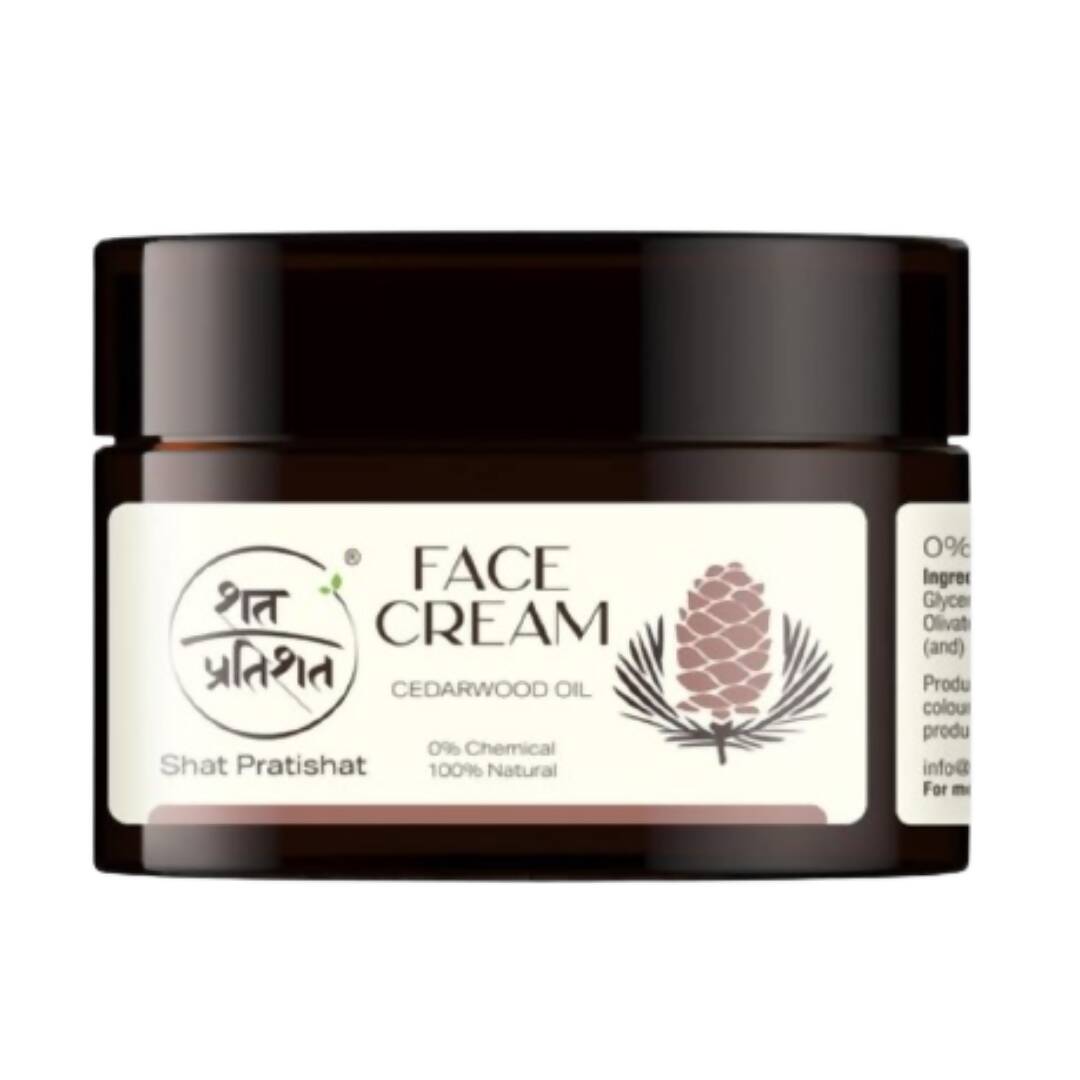 Jar of Shat Pratishat face cream with cedarwood oil on a white background