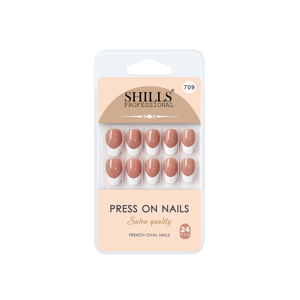Pack of press-on nails with 'SHILLS' branding on a white background