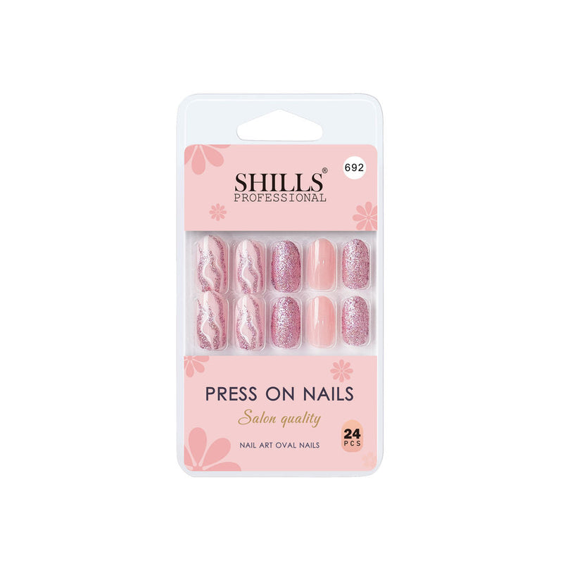 Pack of Shills press-on nails with pink and glittery design on a white background
