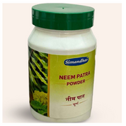 Jar of Simandhar Neem Patra Powder with green lid on a white background