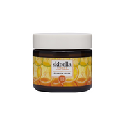 Jar of skinella Vitamin C Night Cream with orange and lemon design on a white background