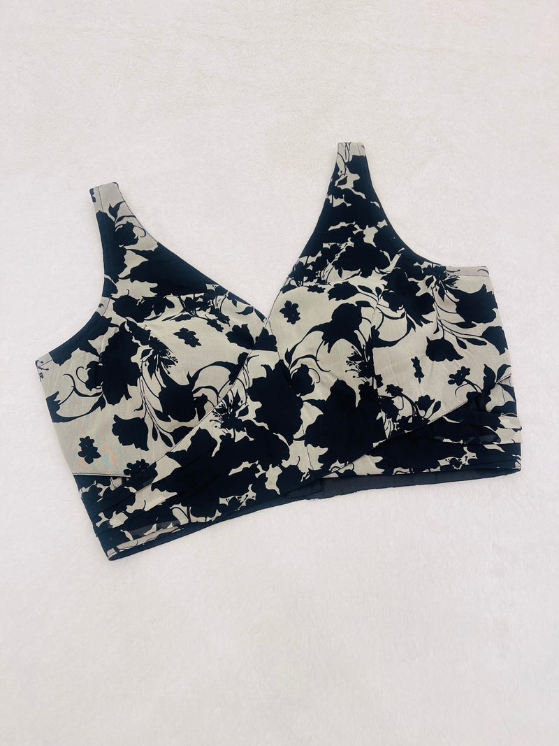 Navy floral sports bra on a white background