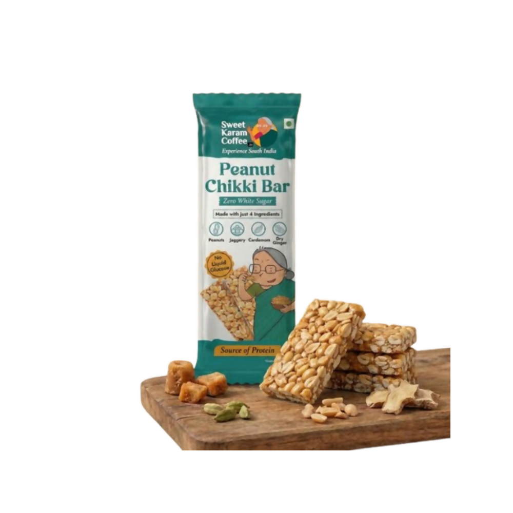 Peanut Chikki Bar packaging with snacks on a wooden board