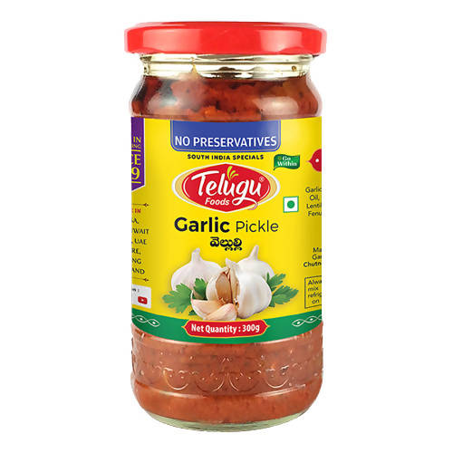 Jar of Telugu Foods Garlic Pickle with a red lid on a white background