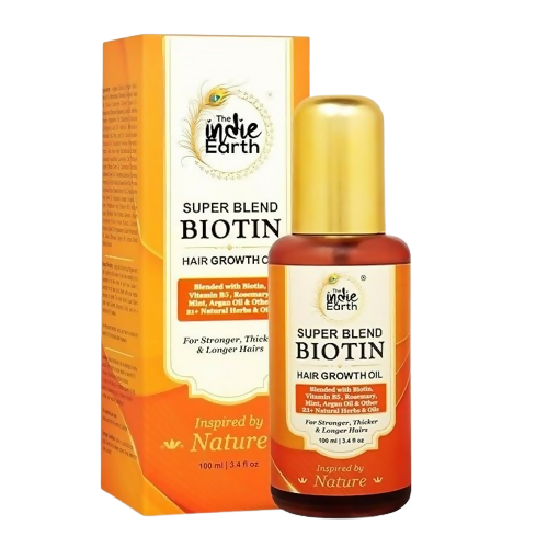 Indie Earth Super Blend Biotin hair growth oil and packaging on a white background