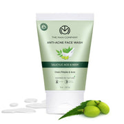 Anti-acne face wash tube with green leaves and neem fruits on a white background