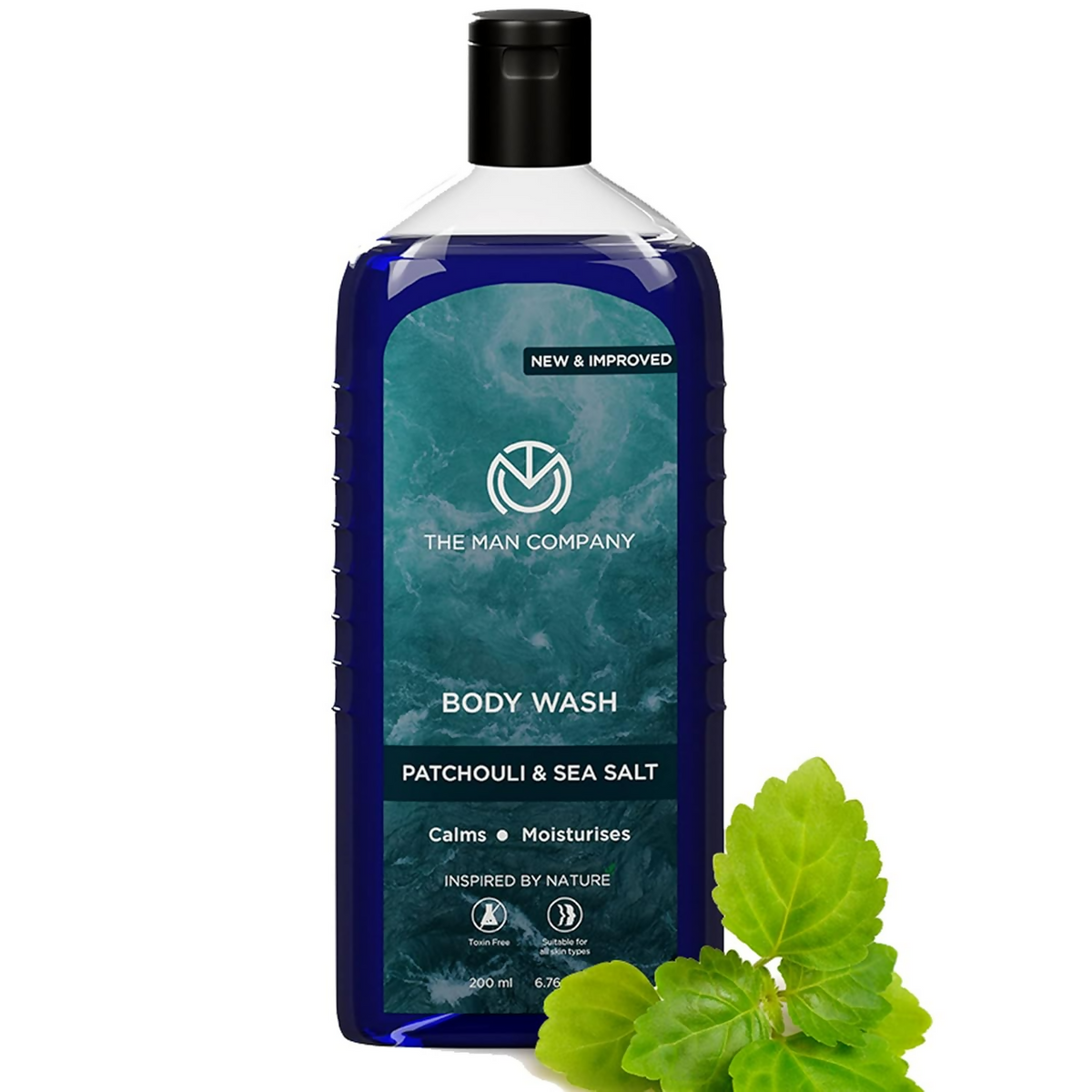 Body wash bottle with green leaf on a white background
