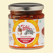 Jar of gooseberry pickle with 'The Pickle Story' label on a beige background