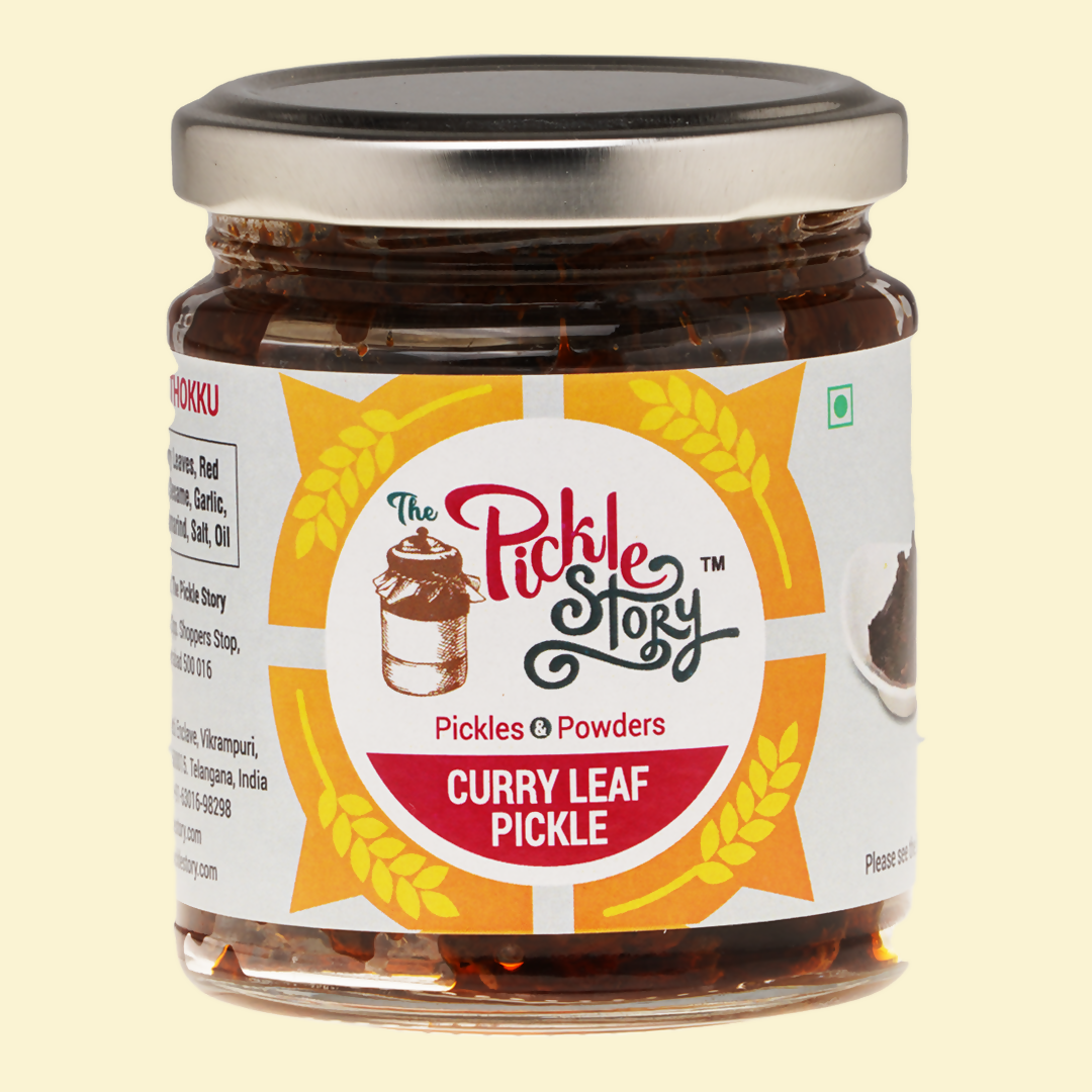 Jar of Curry Leaf Pickle from The Pickle Story on a beige background