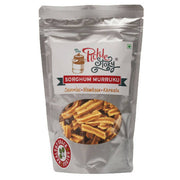 Packaged sorghum murukku with 'The Pickle Story' branding on a white background