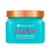 Blue jar of Tree Hut Blue Lagoon Shea Sugar Scrub with a copper lid on a white background