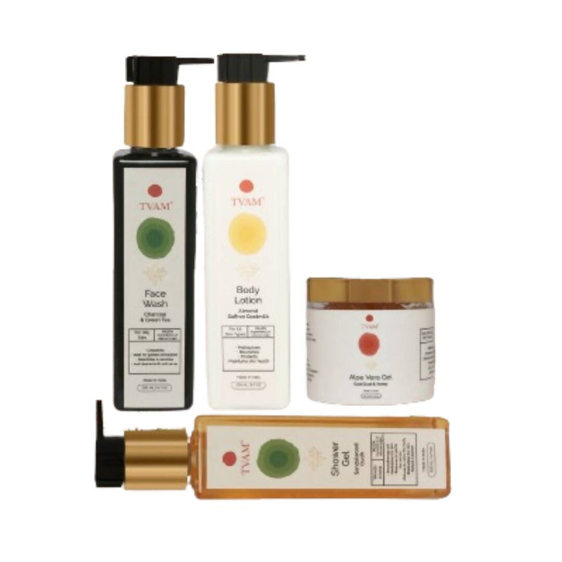 A collection of bath and body care products from Tvam, including a face wash, body lotion, aloe vera gel, and shower gel, with packaging displaying their respective uses and ingredients.