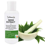 Neem extract bottle with a mortar and pestle and neem leaves on a white background